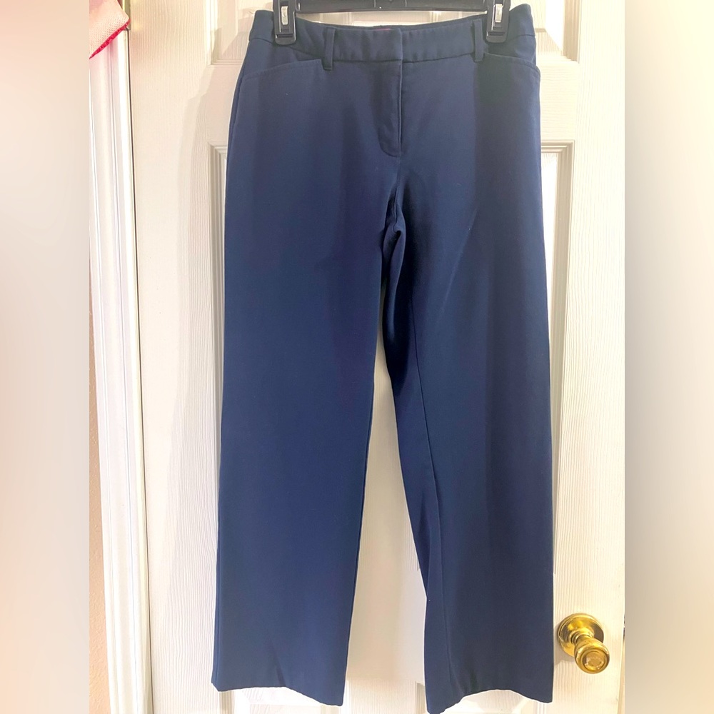 Navy blue pants. Pockets on side and back